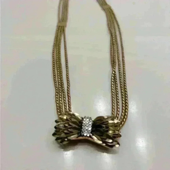 Stella and Daughter gold bow necklace with rhinestones. - Picture 2 of 3